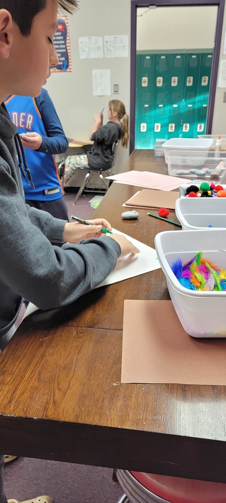 Student painting rocks