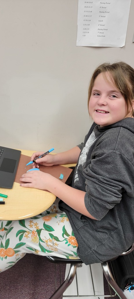 Student painting rocks