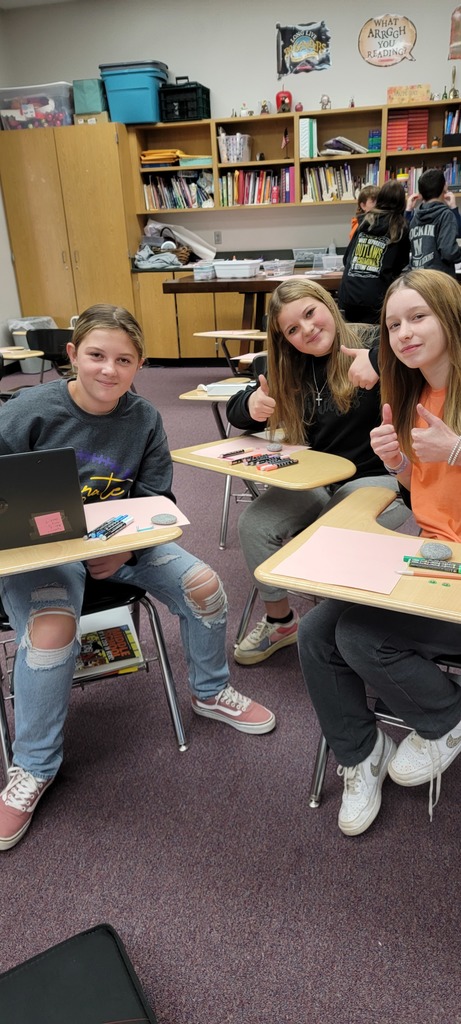 Student painting rocks