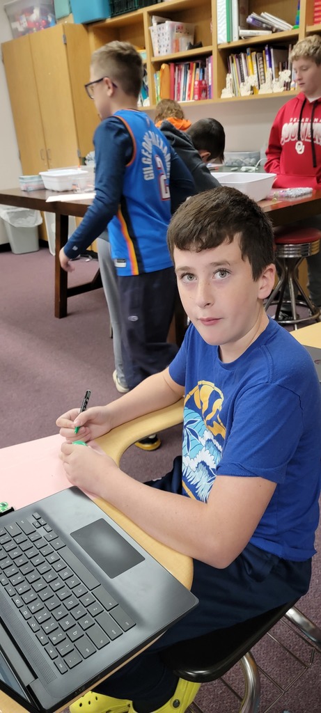 Student painting rocks