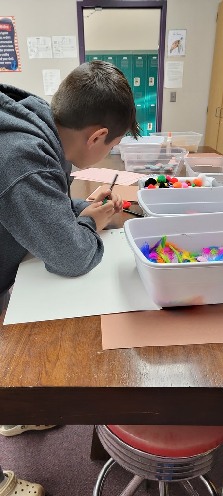 Student painting rocks