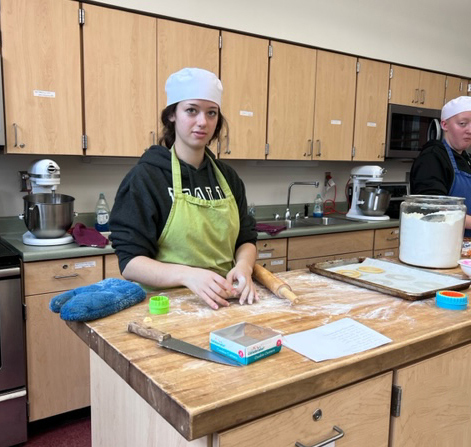 student in baking class