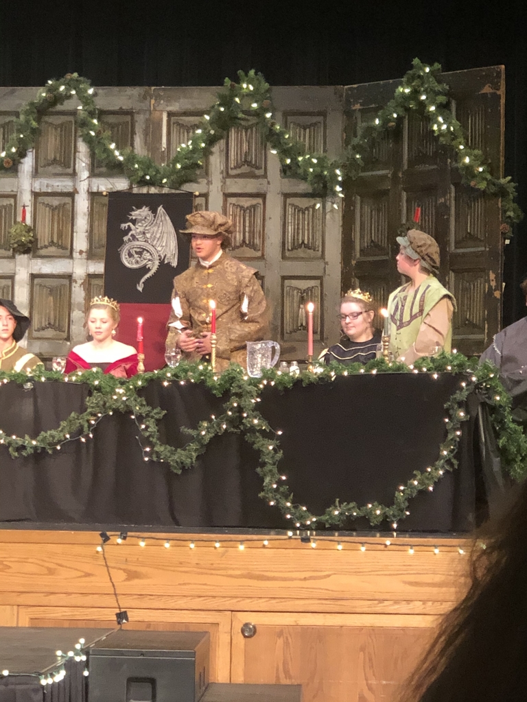 Members of the royal court entertain the crowd