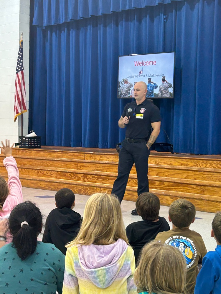 Special guests Logan Wescott, and Mark Fowler spoke to the 4th grade about being a firefighter and Marine as part of the career series by Coach Redd.