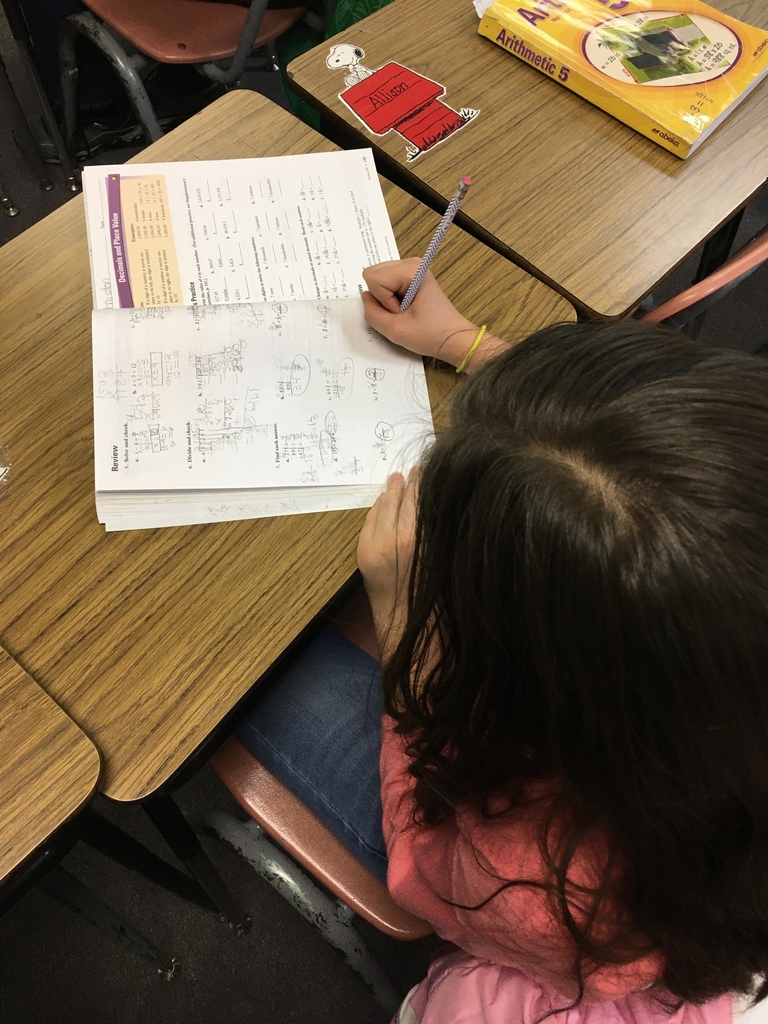 5th grade student working on math