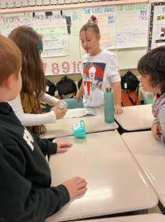 students completing project