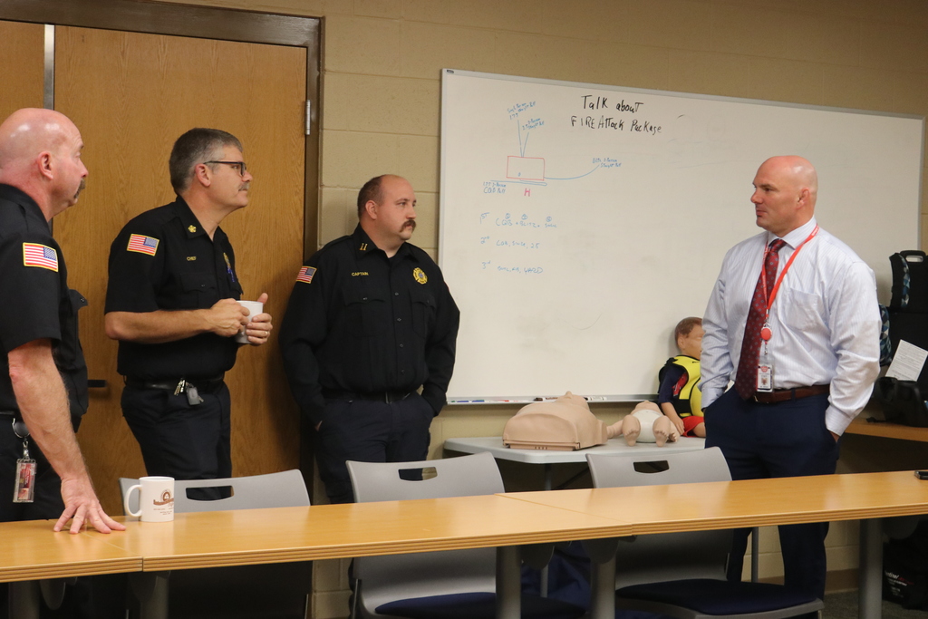 Mr. Moran talks with the FIre Department employees.