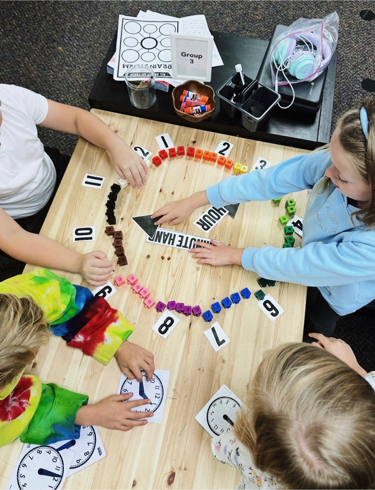 2nd graders working with time