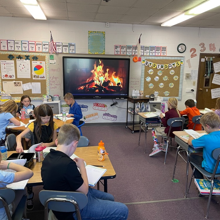 third grade class completing an assignment