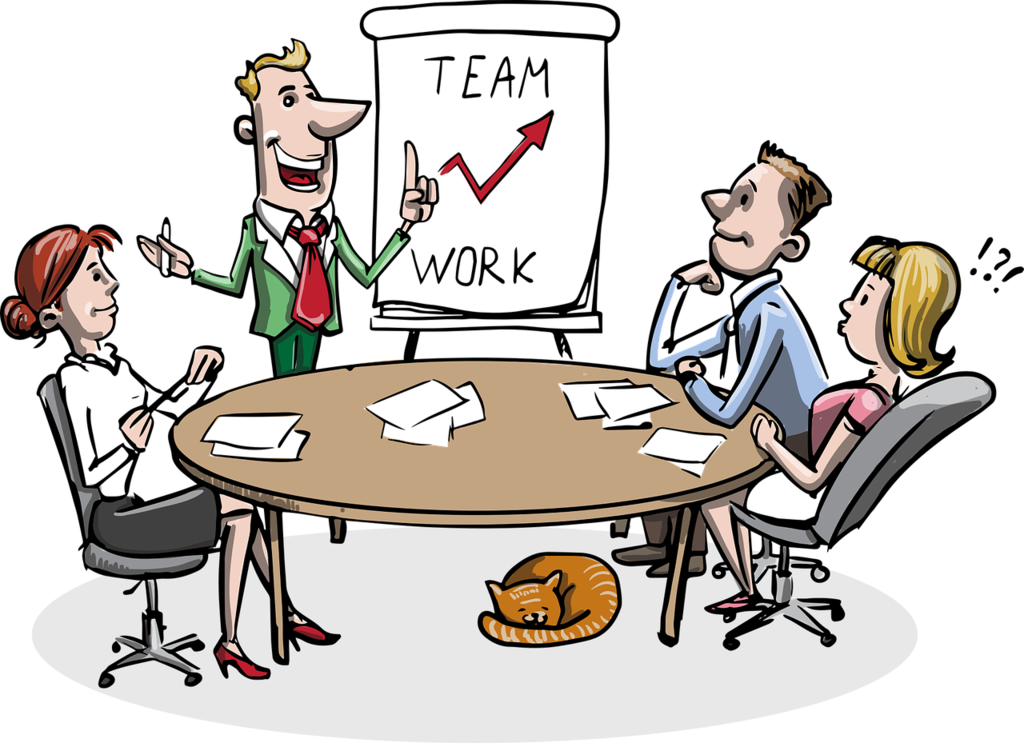 People sitting around a table for a meeting