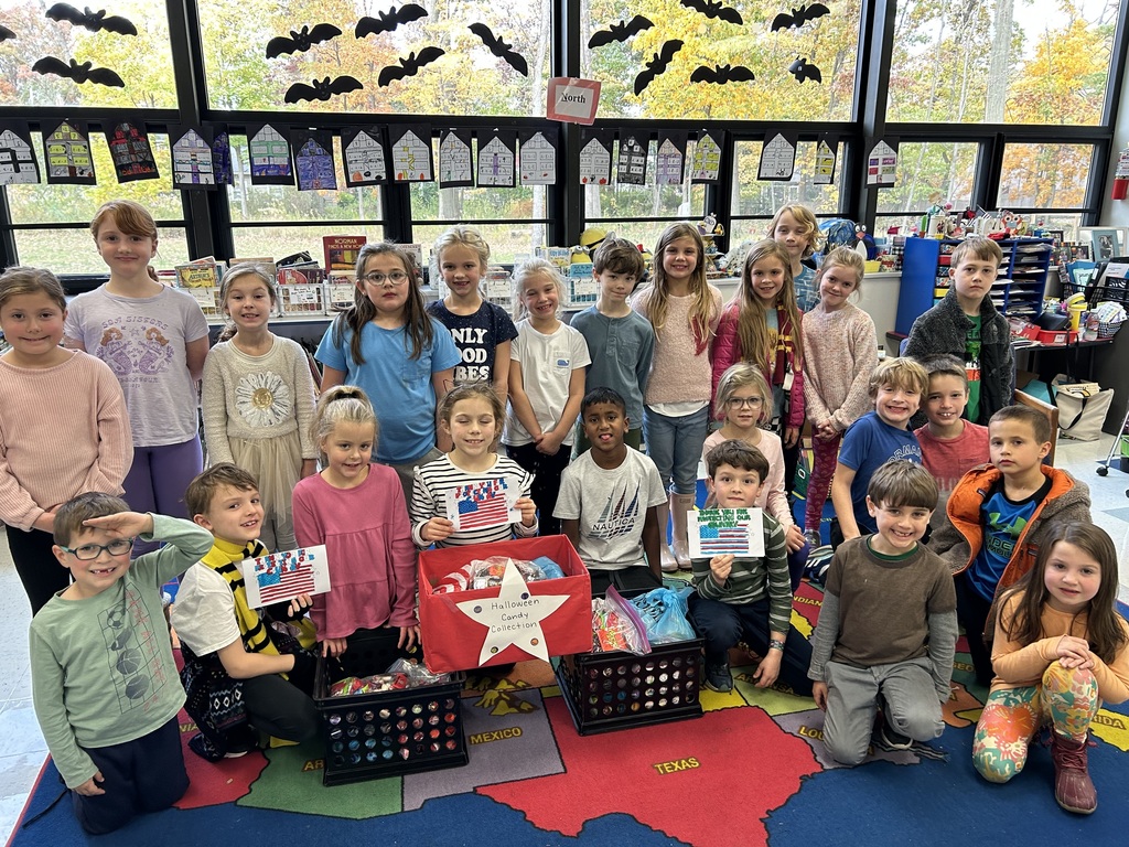 Normandy's Kids Who Care club photo honoring veterans