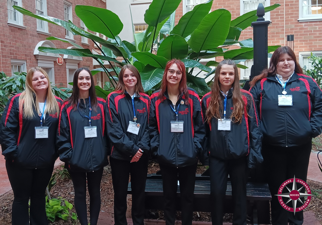 Group photo of 6 students at a Skills USA conference in Albany, NY.