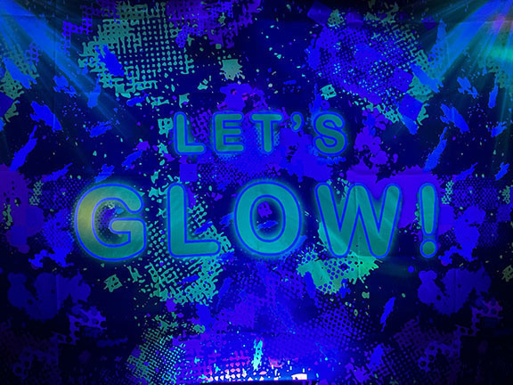 Neon sign that reads Let's Glow.