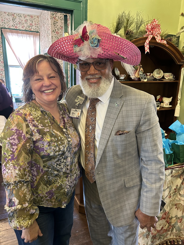 superintendent with flower hat