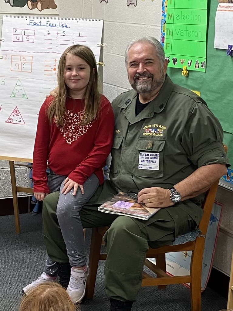 Army Veteran Mr. Riley and his granddaughter celebrated Veterans Day photo