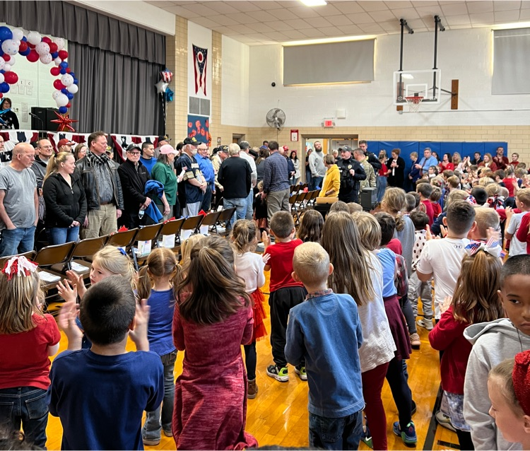 students clapping in veterans