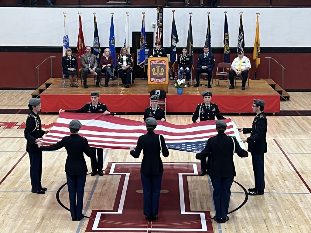 The JROTC folds a flag for a ceremony