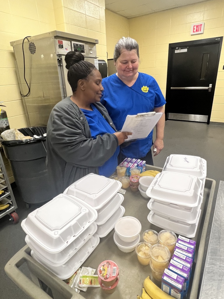 Manager Tracy Smith and staff Brenda Connell making sure everything is prepared to serve.