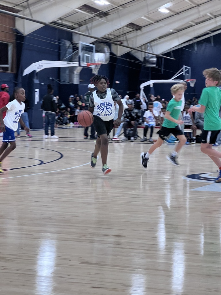 Glen Lea student dribbles down the court.