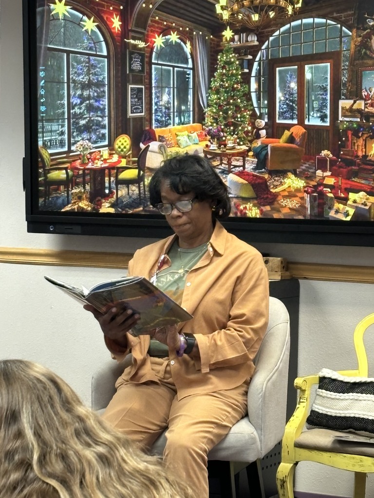 Mrs. Little reading