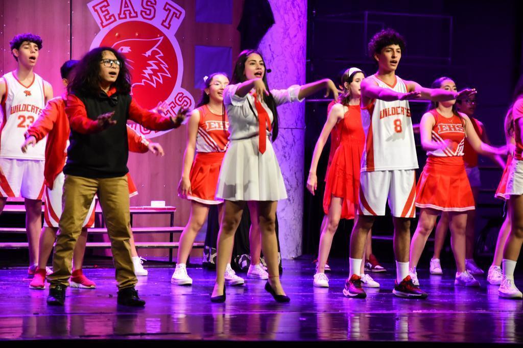 Students acting on stage