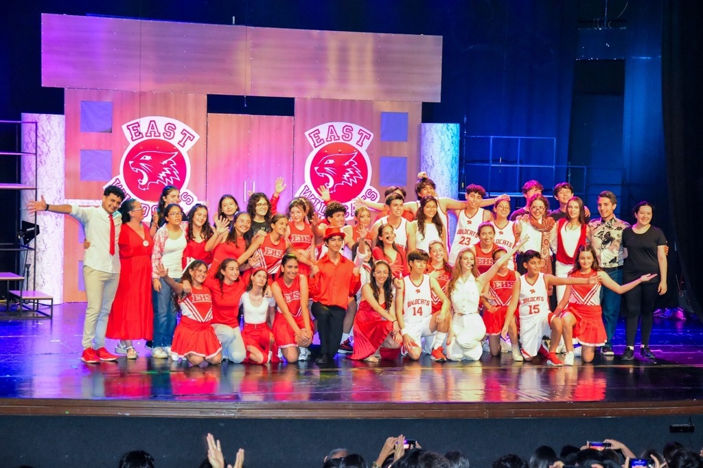 Students acting on stage