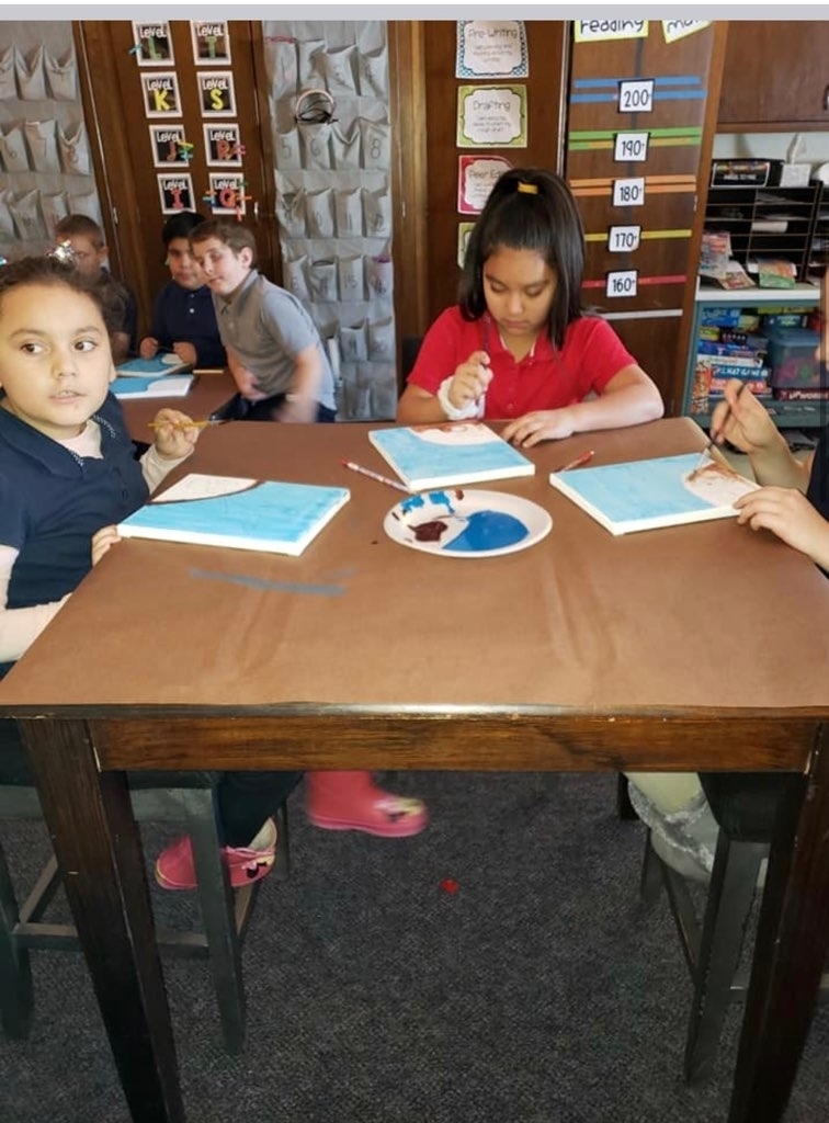 3rd graders working together