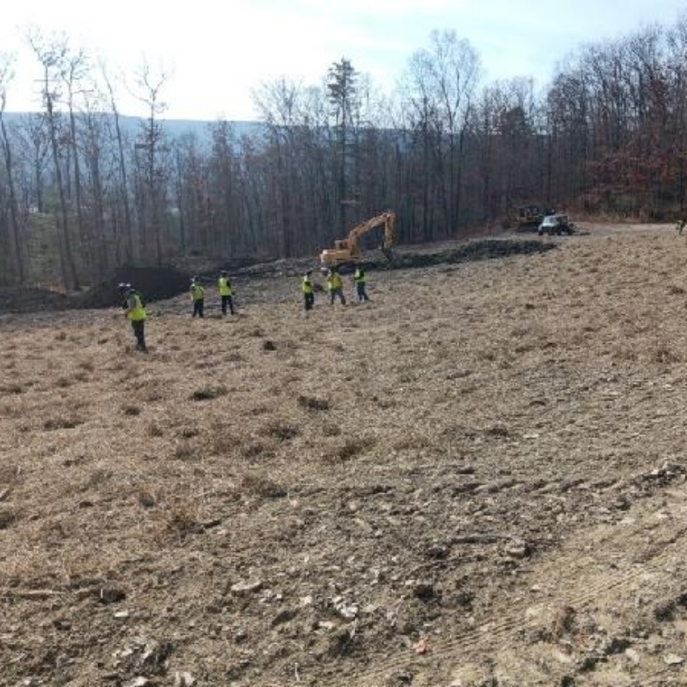 starting the core trench in the background 