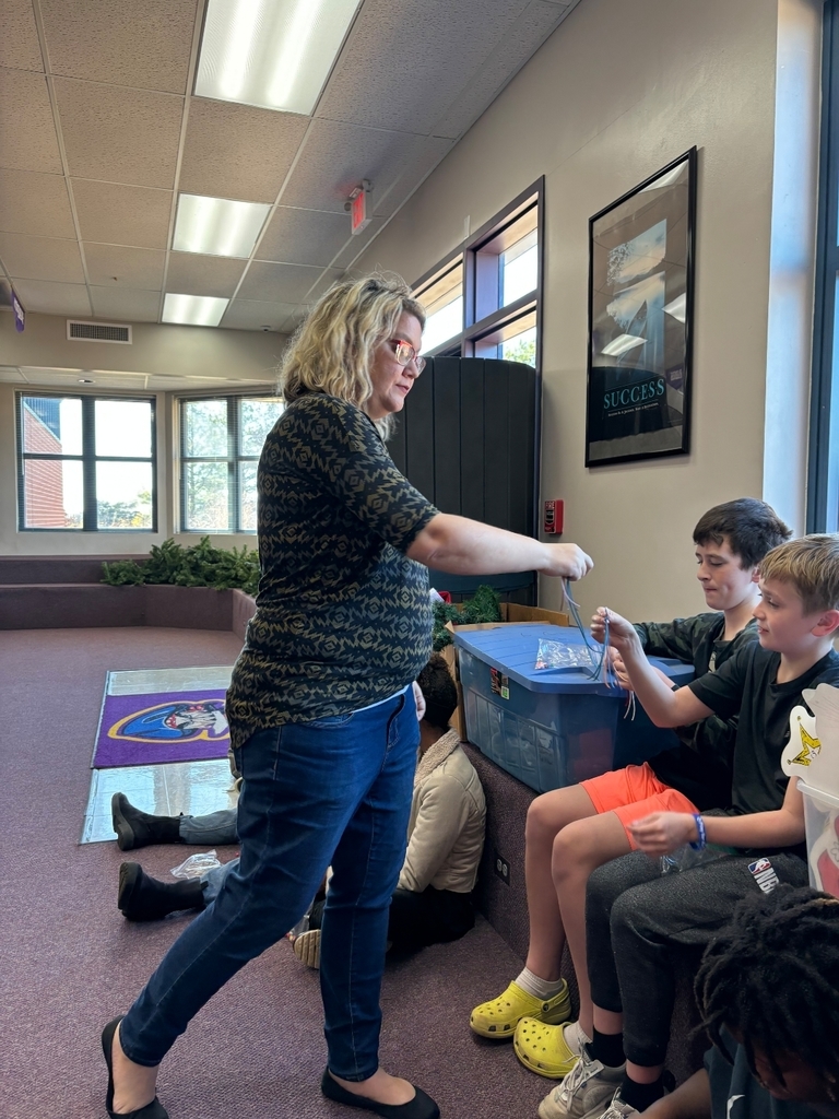Students creating beaded keychains