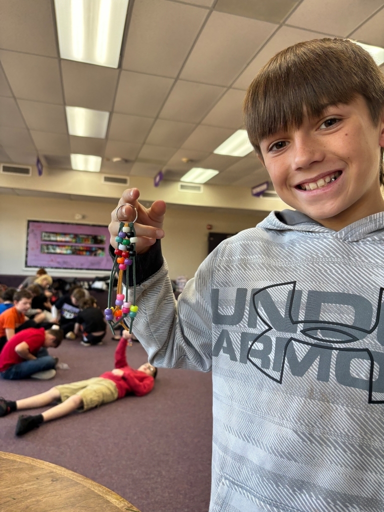 Students creating beaded keychains