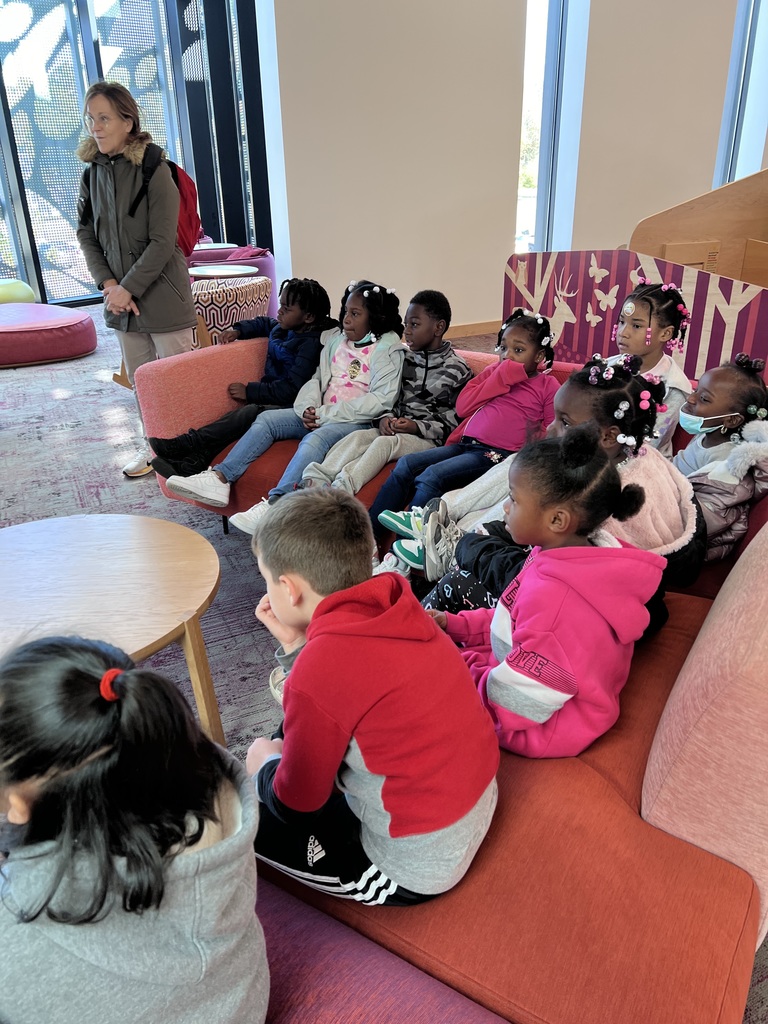First graders listen to the tour.