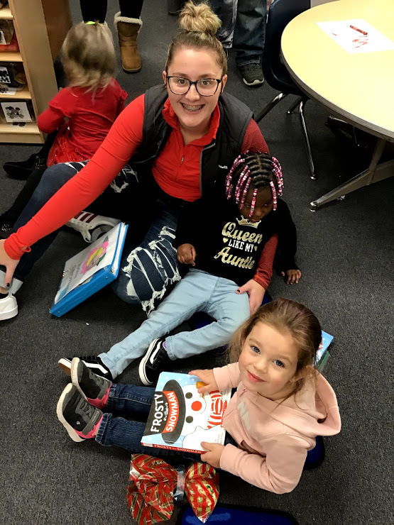 Teagan hanging with the kids as they read their new books!