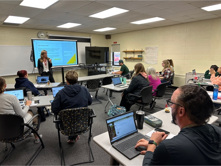 Staff engaged in learning session