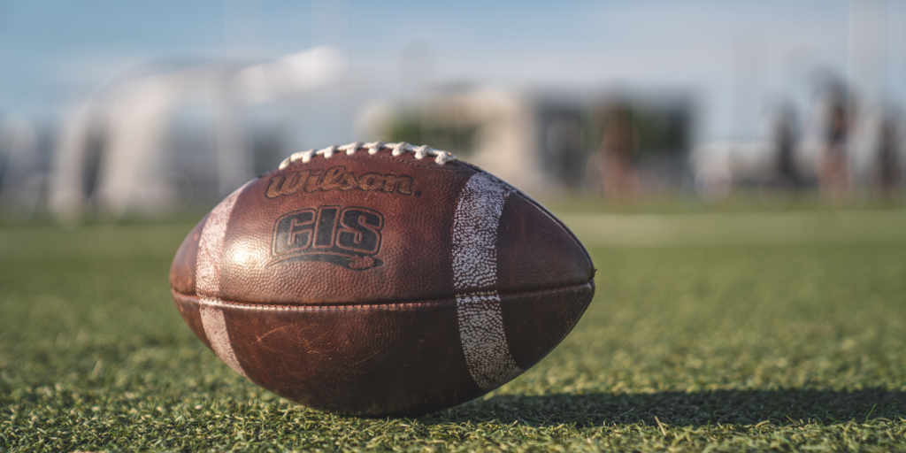 Closeup of a football on a field