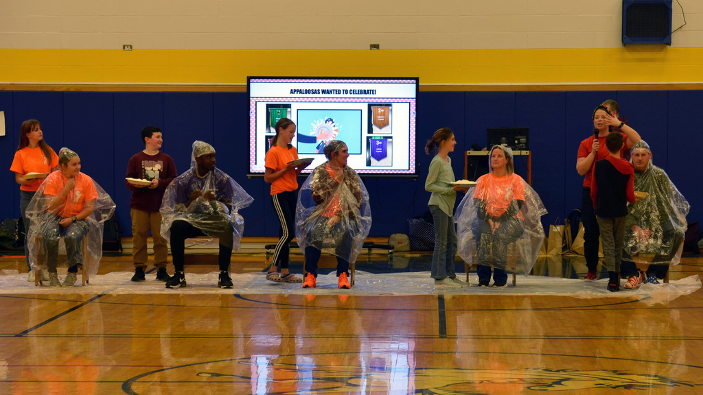 Teachers prepare to be pied by students