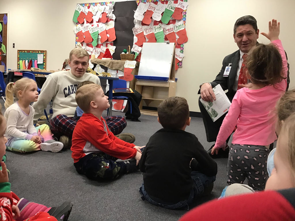 Mat giving a child a high five