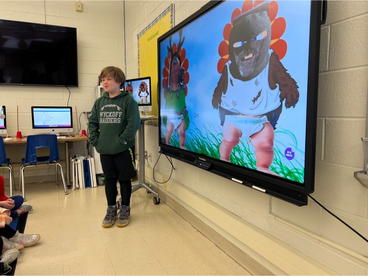 student sharing disguised turkey on Promethean board  