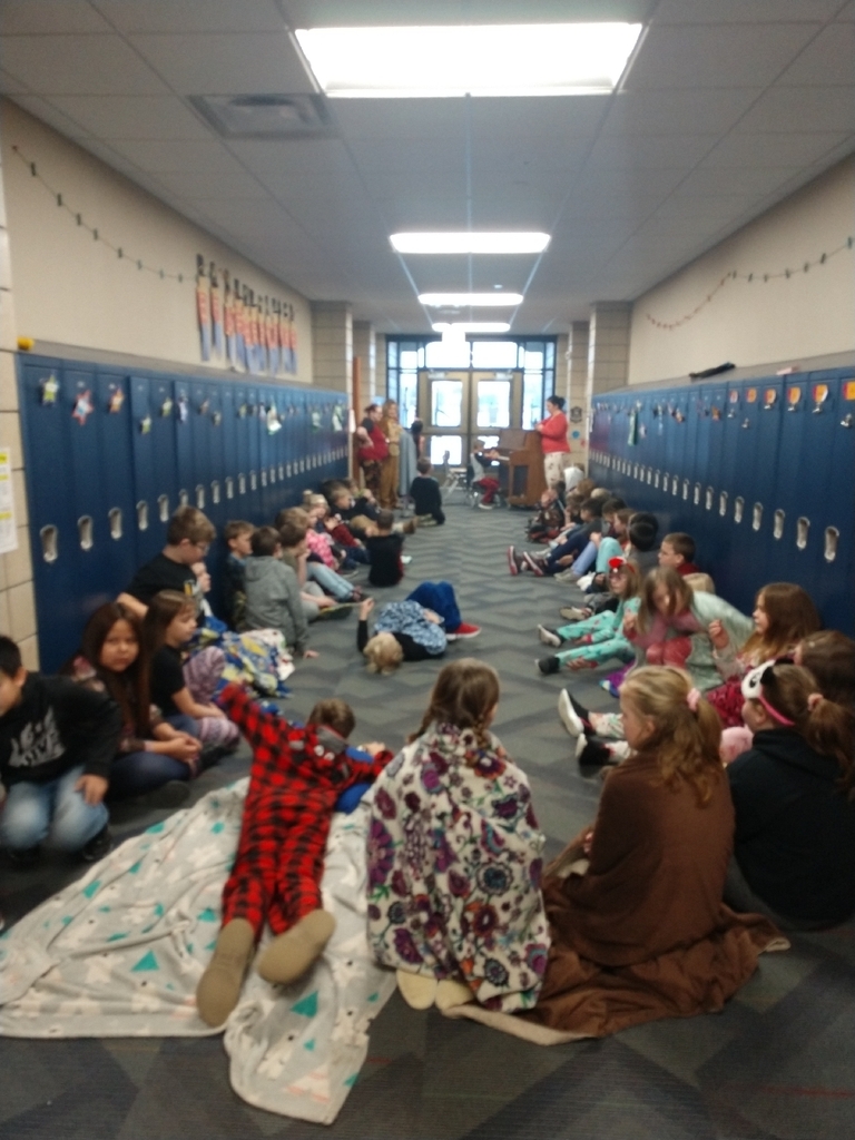 Students listening to holiday tunes