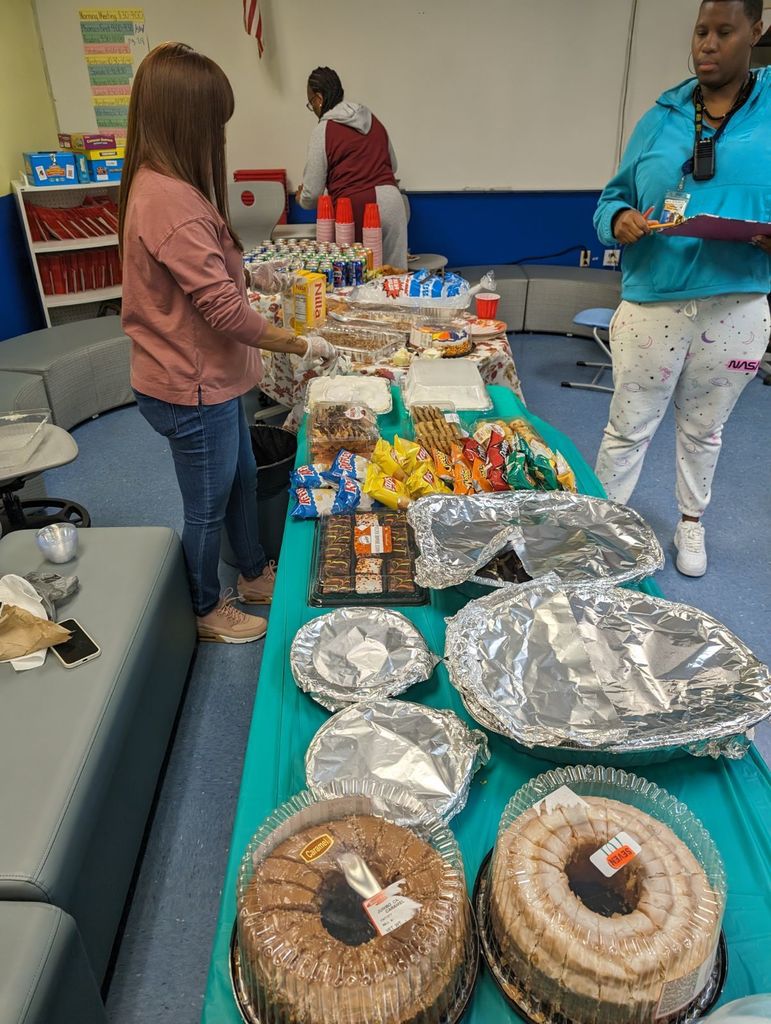 Various people eating a variety of food