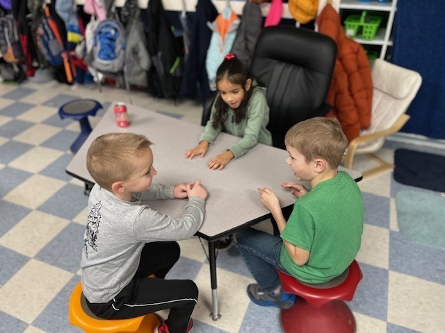 first grade students practicing kindness