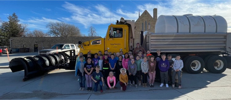 Scoop There it Is & the second grade class.