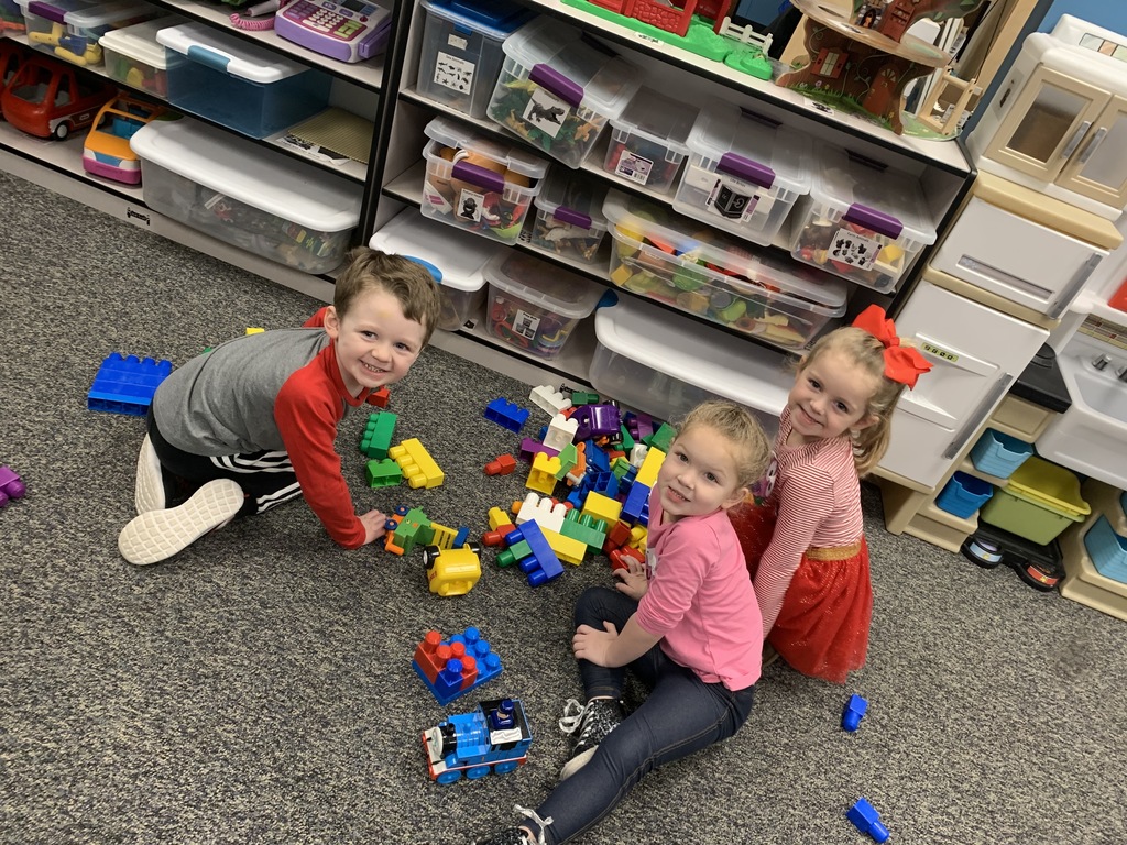 4 yr olds playing with big legos