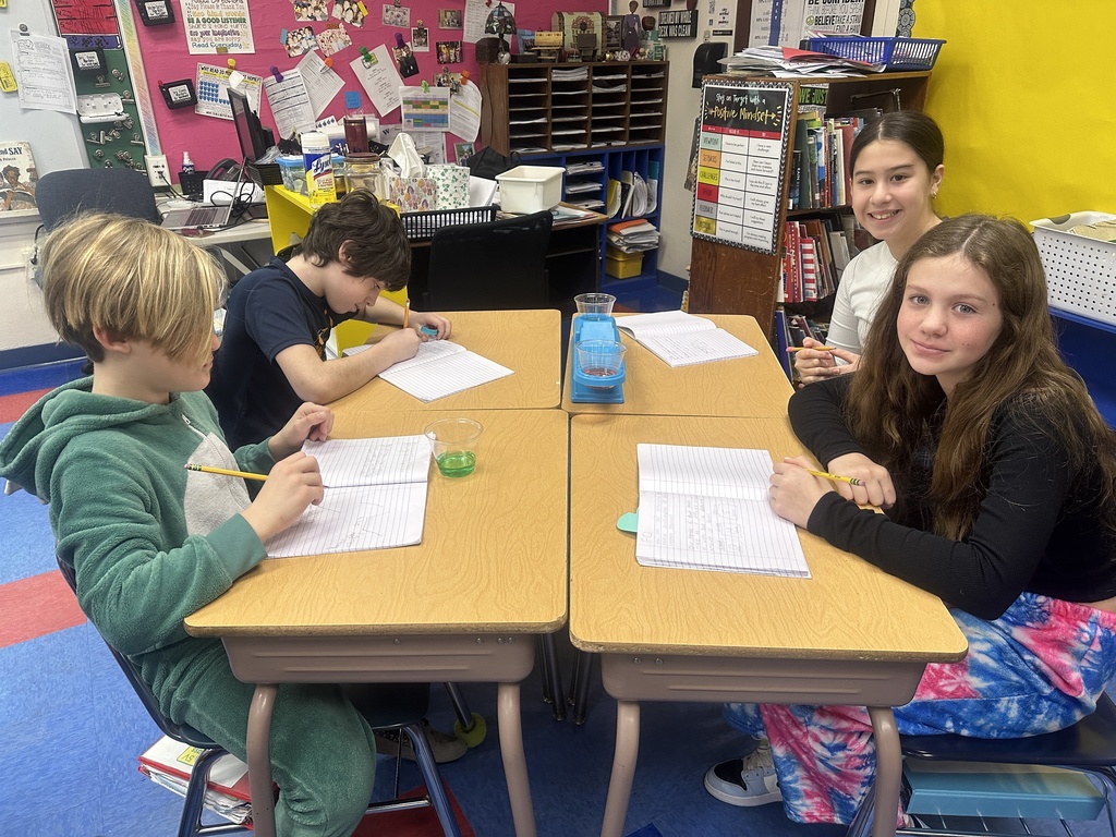 group of students working together in science