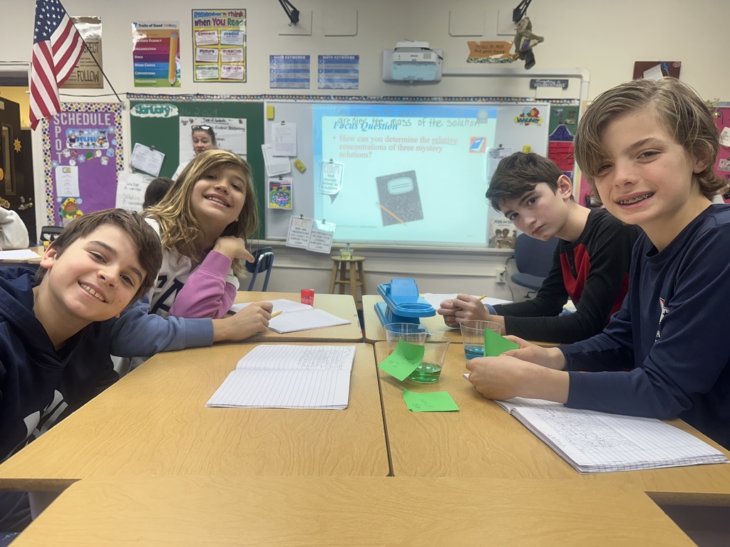 students working together in science