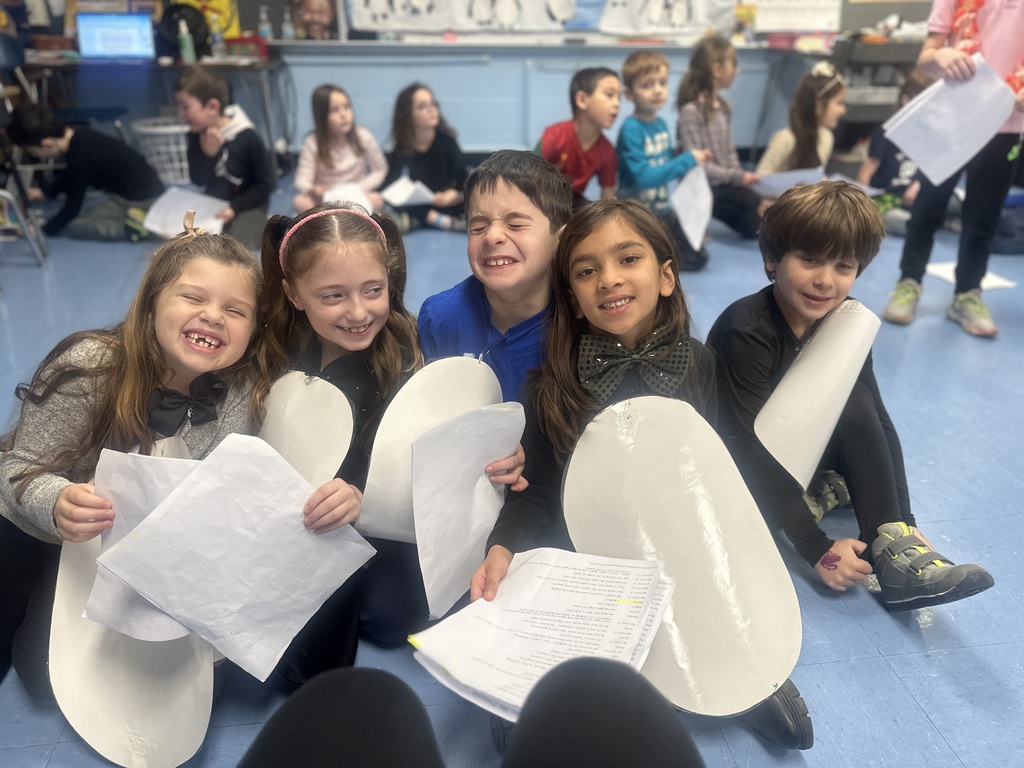 students preparing to perform Tacky the Penguin