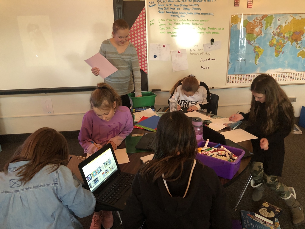 Fourth grade students designing paper circuits.