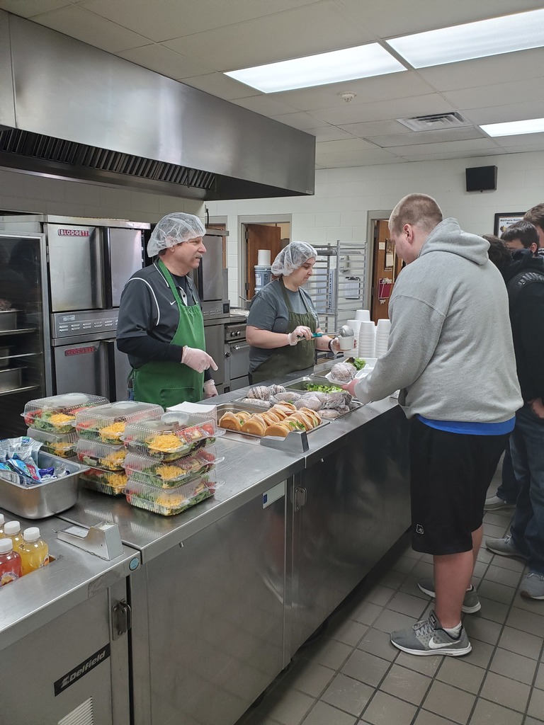 Superintendent Mark Schneider fills in as HS cook