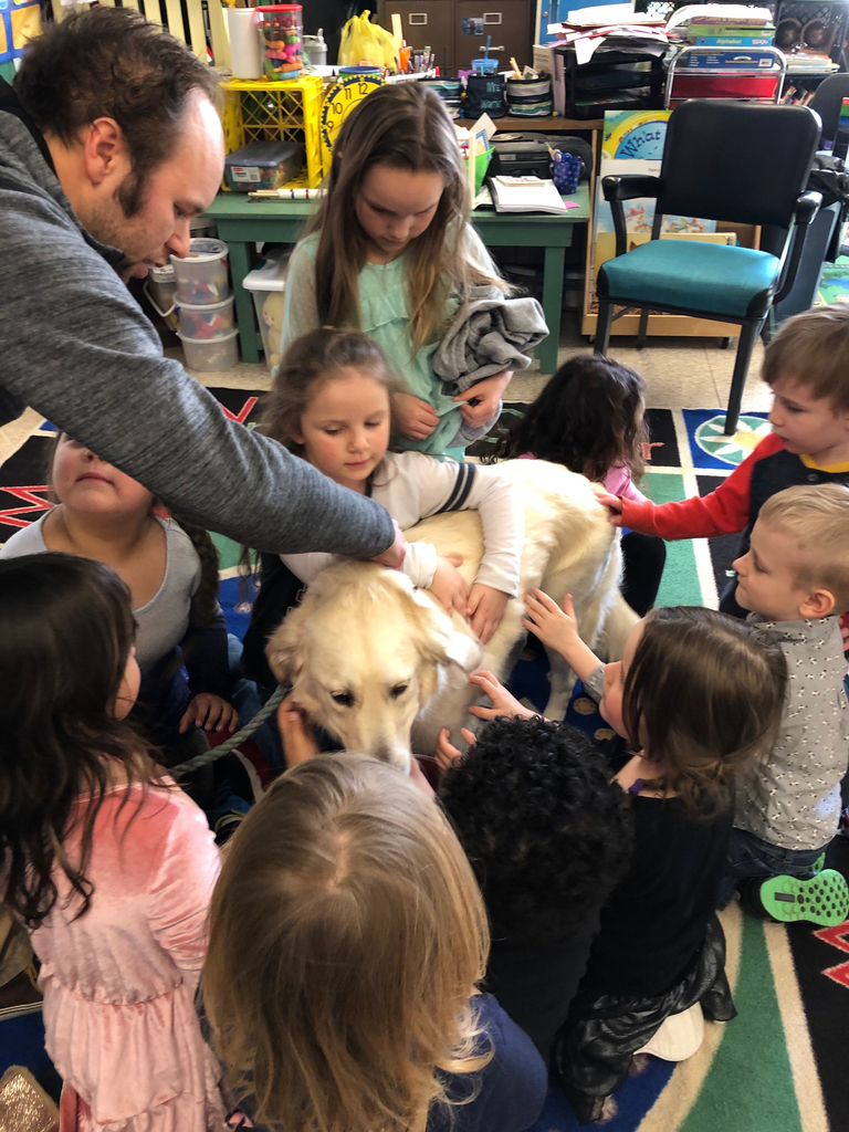 Kindergarten students enjoying Sylvie’s company.
