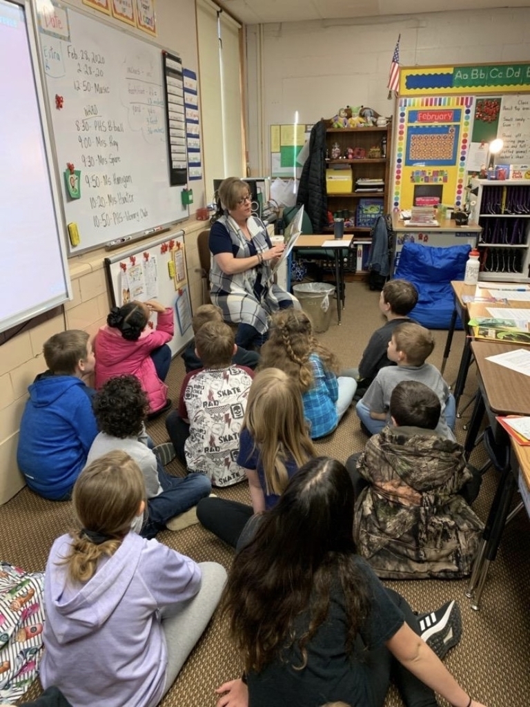 Superintendent Mrs Ray Reading f to a 3rd grade class for World Read Aloud Day. 