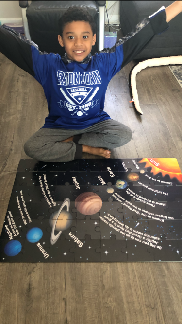 Mike learning about the planets